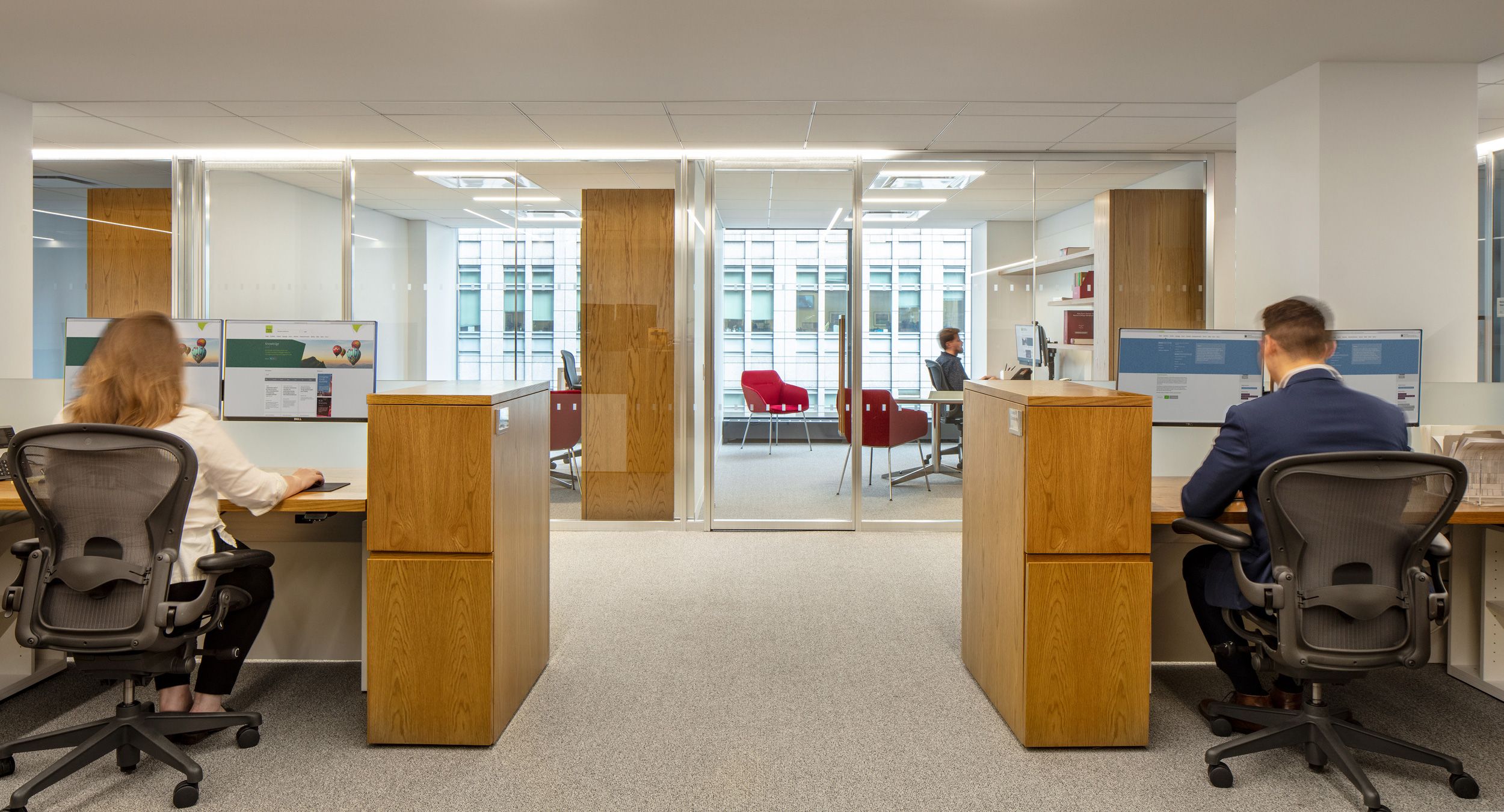 NEW MILLENNIA open offices in Flat Cut White Oak with custom stain finish.